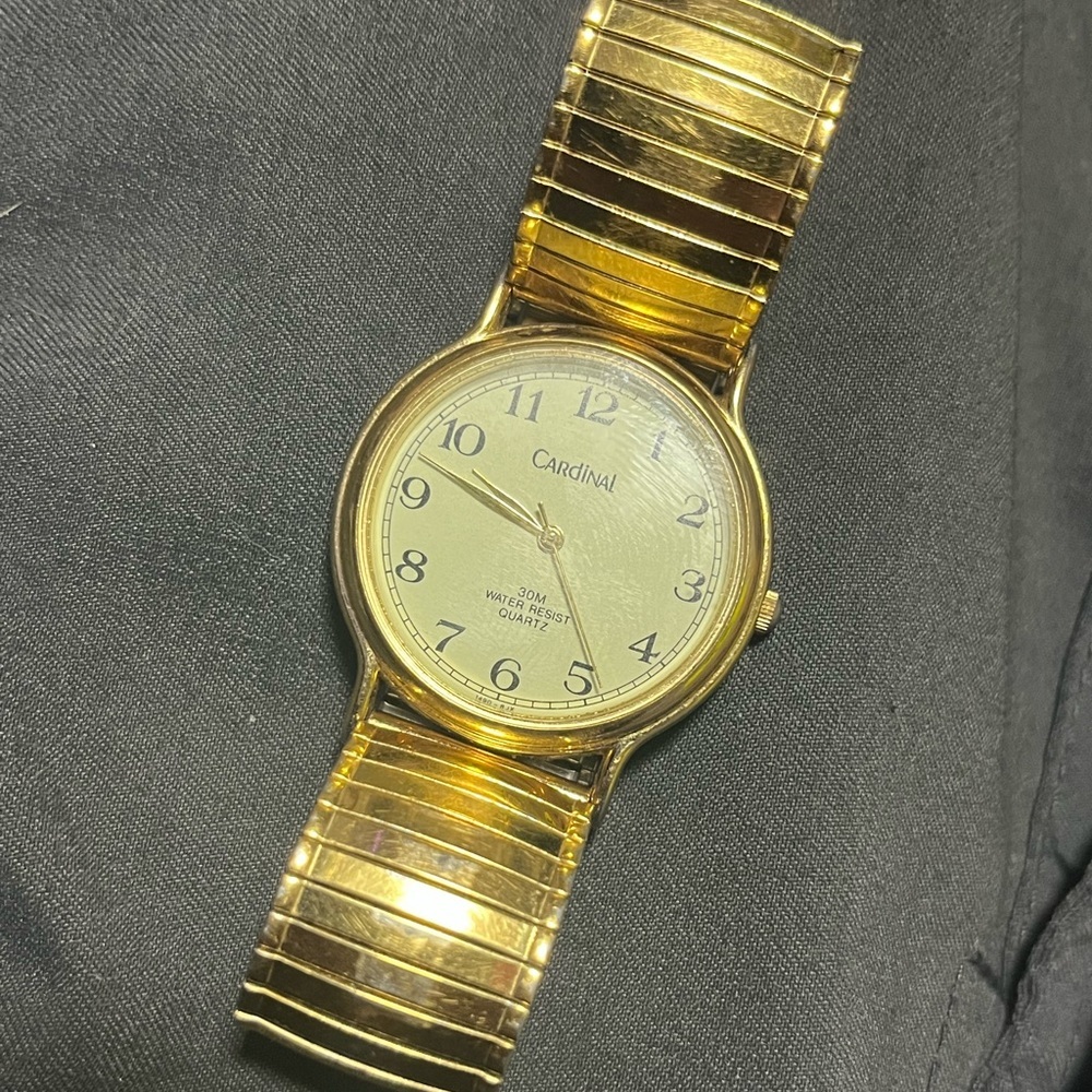 Cardinal Gold-Tone woman’s Watch